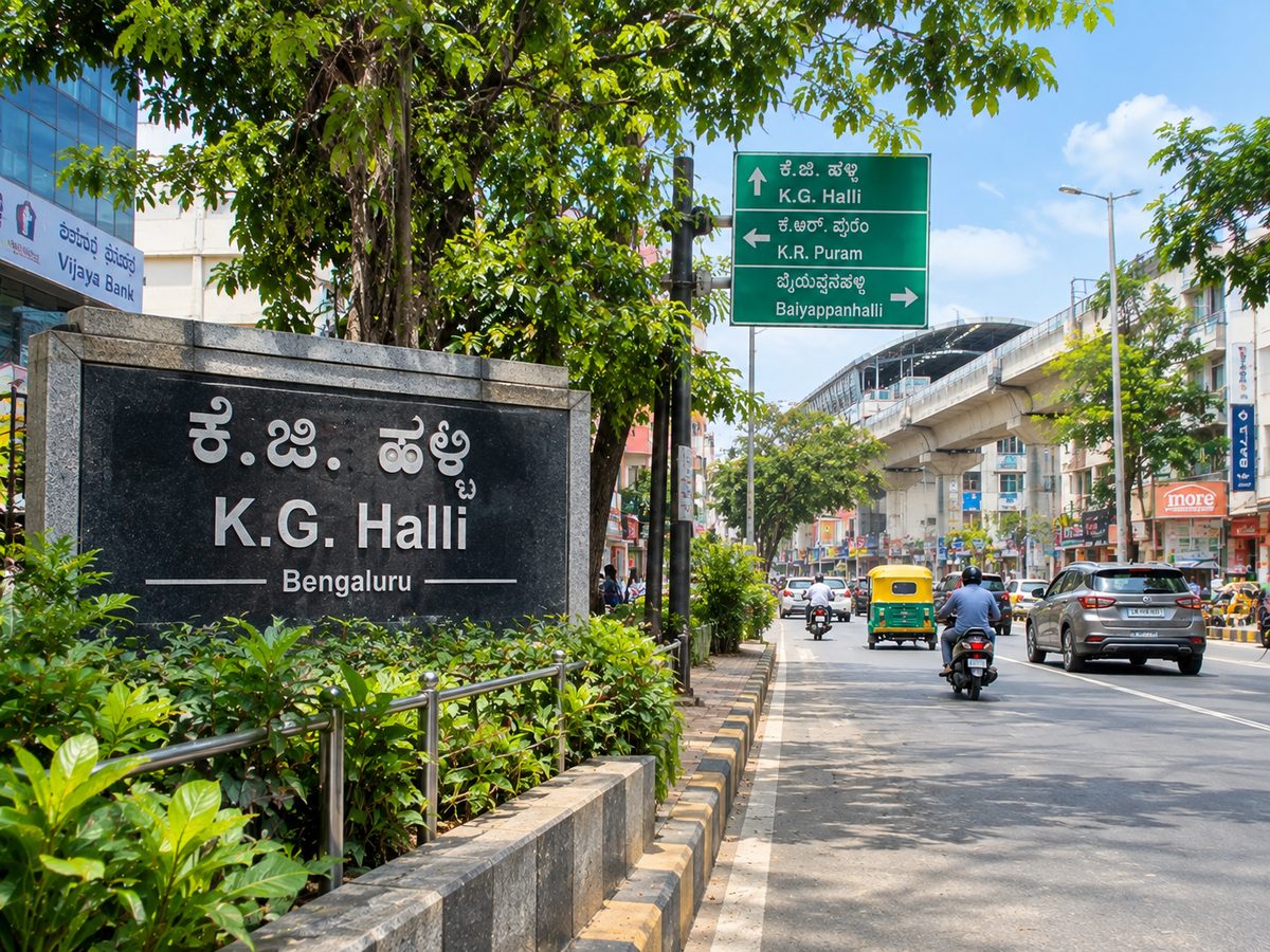 KG Halli Bangalore urban road with shops, traffic and residential buildings
